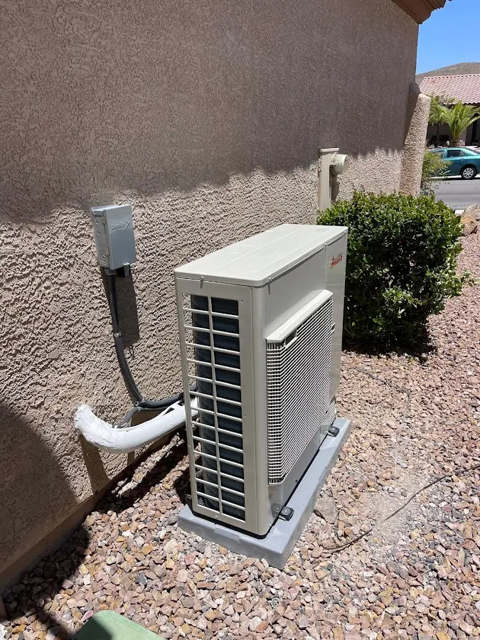 Residential air conditioning condenser unit in Yelm